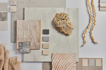 Flat lay of creative architect moodboard composition with samples of building, textile and natural...