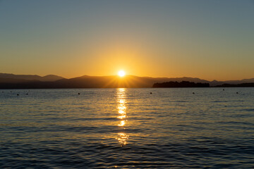 Fototapeta premium Beautiful sunrise on the shore of the blue sea, Gorgeous colorful landscape, Corfu Island, Greece