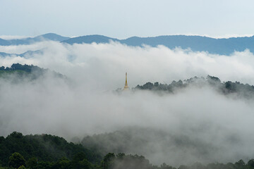 Temple, Santi Tham  pagoda or stupa in fog  ,Mae Salong, Chiang Rai, Thailand