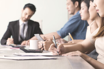Fototapeta premium Manager and his team having meeting at meeting room in office.