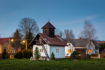 Fototapeta premium Traditional log cabins in Cremomsne village, Turiec region, Slovakia.