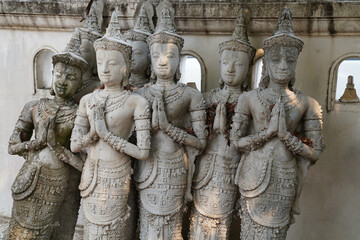 ancient monolithic Buddhist statues near the temple