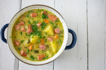 Pot of potato soup with vienna sausage