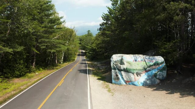 Wide aerial shot of Keep Maine Beautiful Rock (Pockwockamus Rock) outside Baxter State Park, Millinocket Maine