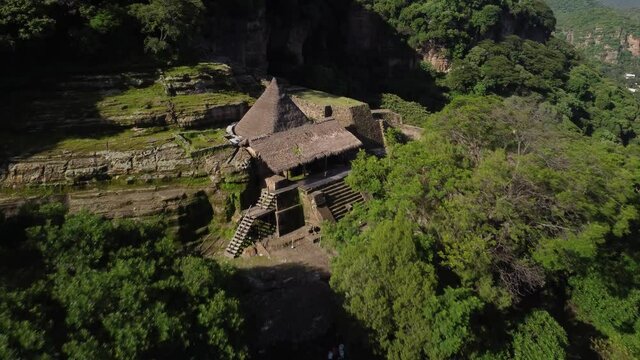 Closeup of the jungle ruins of a former sanctuary for the elite Jaguar and Eagle warriors during the Aztec empire. The pyramid is located in Malinalco, Mexico, and is a stunning experience.
