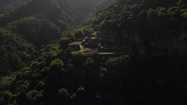 Revealing the mysterious ruins of an old Aztec pyramid in the Mexican jungle near the town Malinalco.