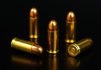 golden bullets on a black background	
