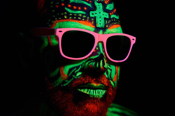 middle-aged man with neon makeup