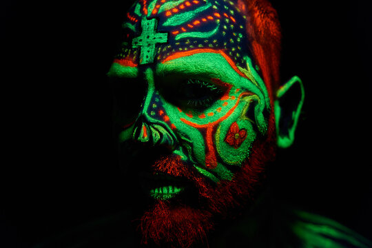 middle-aged man with neon makeup