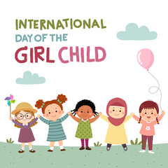 International Day of the girl child background with little girls holding hands together in the nature.