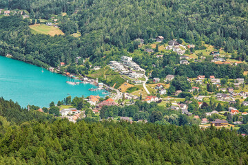 Naklejka na ściany i meble Aerial view to surroundings of Worthersee lake in Austria, summe
