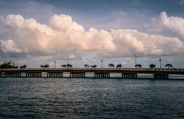 Fototapeta na wymiar sunset on the pier sea Miami Florida usa sky clouds