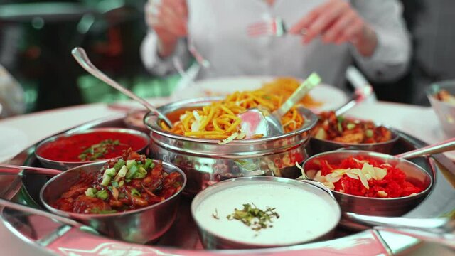 Meat thali served in a restaurant.