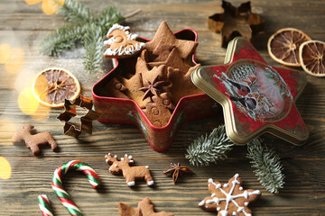 Christmas cookies in a metal box in the form of an asterisk. biscuits in the form of deer and...