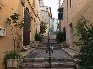 The staircase on Rue des Moulins on a summer sunny day in Le Panier - Marseille's oldest and most visited neighborhood.