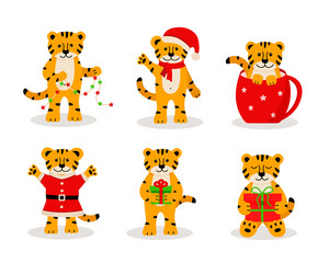 Obraz premium A set of Christmas tiger, cute cartoon symbols of the year. Vector illustration, the concept of Christmas and New Year.