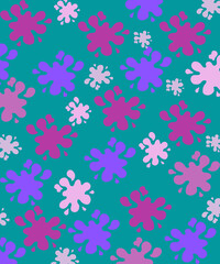 Ink stains of various colors on a green background