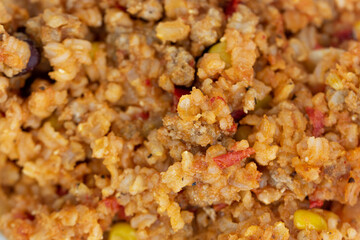 mexican meal - brown rice with pepper, meat, bean and corn