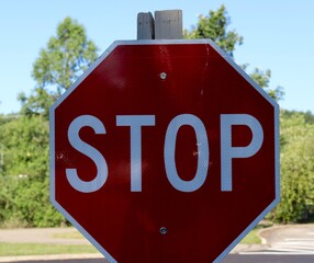 A close view of the red and white stop sign.