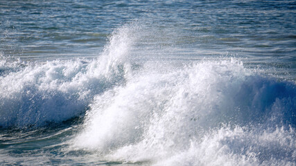 Breaking waves in the Pacific Ocean off the coast of Kauai