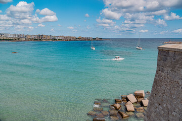 Fototapeta premium OTRANTO. LECCE. SUMMER 2021. Sunny day in the beautiful Otranto. View of the tourist port and gulf