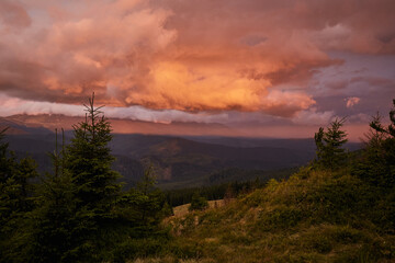 Sunrise in the mountains landscape. Overcast sky before storm. Carpathian, Ukraine, Europe.