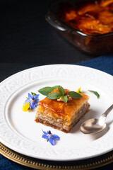 Food concept Homemade Baklava dessert on black background with copy space