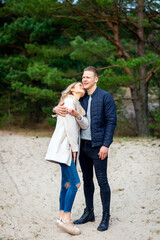 Happy loving couple enjoying of happiness love and tenderness, dating, romance.Couple hugging in love at spring park.