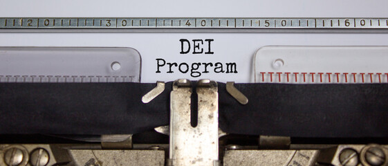 DEI, diversity equity inclusion program symbol. Concept words 'DEI program' typed on old retro...