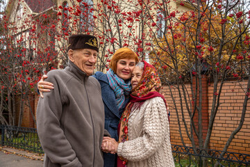 Obraz premium Shot of a happy elderly asians couple with daughter
