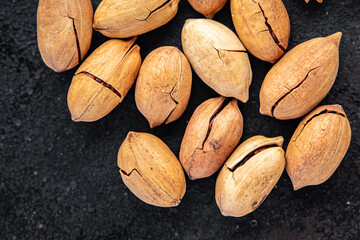 pecan nut fresh portion ready to eat meal snack on the table copy space food background rustic. top view keto or paleo diet veggie vegan or vegetarian food
