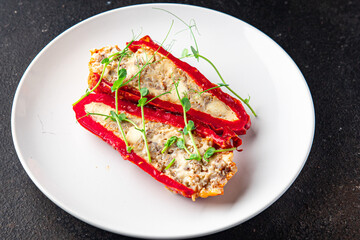 pepper stuffed vegetables meat pork, beef or chicken meat veggie fresh portion ready to eat meal snack on the table copy space food background rustic keto or paleo diet 
