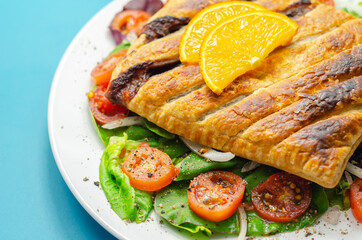 Tasty steak slice, british steak with sauce, potato and leek, wrapped in puff pastry