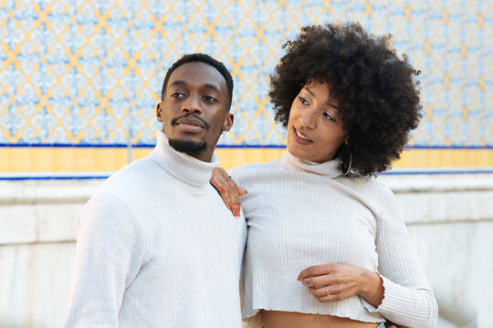 Black couple in a smart pose at Valencia Market