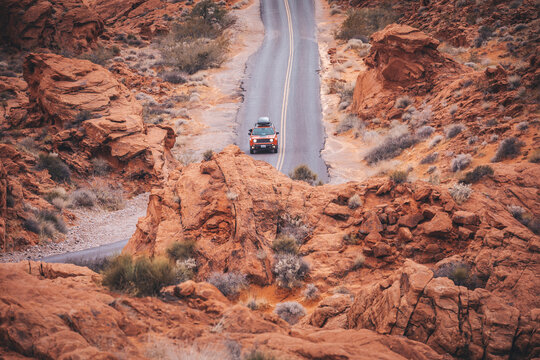 A car is on a road in Valley of Fire State Park