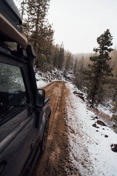 4x4 driving across snowy and icy road in Tenerife
