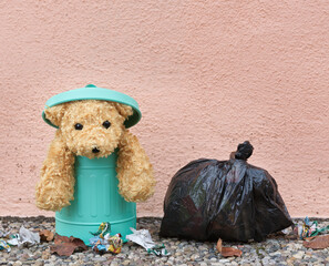 Abandoned pet in trash can Abstract