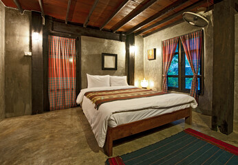 Bedroom at traditional Thai homestay hostel