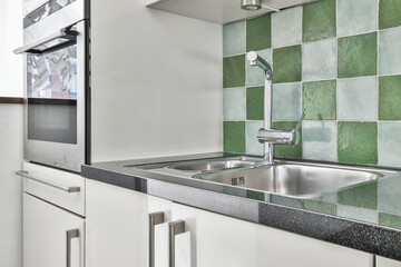 Close up of elegant sink in luxury kitchen