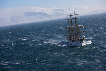 big sail boat leaving the bay of Reykjavik for the North Atlantic