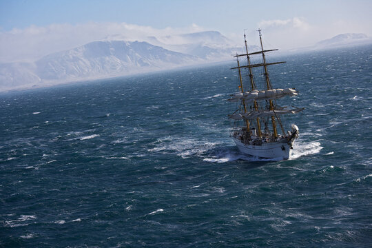 big sail boat leaving the bay of Reykjavik for the North Atlantic