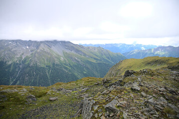 Fototapeta na wymiar Summer Alps on a cloudy day