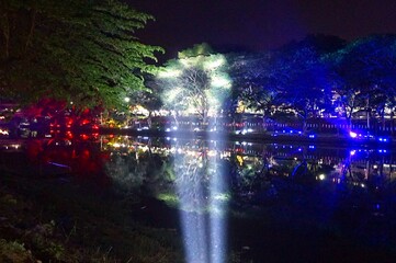 Night light show in Loy Krathong Festival at lamphun ,Thailand - 457376873