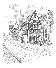 Travel sketch of Quedlinburg, Germany. Hand drawing of the old town and a street cafe. German houses line art. Hand drawn travel postcard. Urban sketch in black color isolated on a white background.