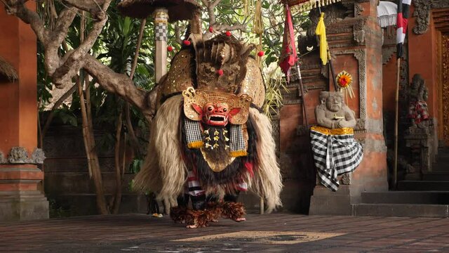 Traditional Indonesian Barong Dance with a lion and a monkey. Balinese mythology with the demonic witch Rangda.