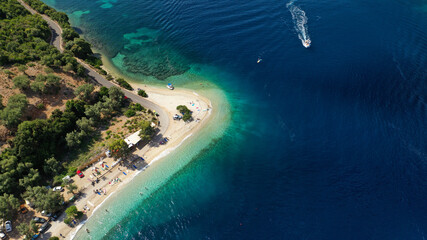 Aerial drone photo of paradise turquoise beach of Amoglossa meaning a sand tongue with crystal...