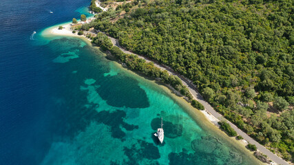 Aerial drone photo of paradise turquoise beach of Amoglossa meaning a sand tongue with crystal...