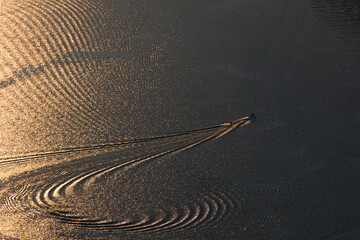 boat in the lack at sunset 