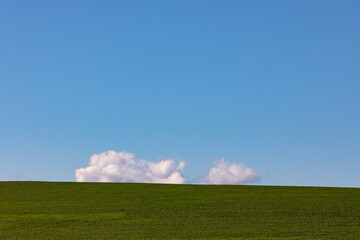 General view of countryside landscape with cloudy sky