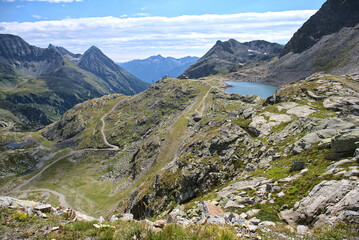 Fototapeta premium Hiking in Mölltaler Glacier area, high mountains, glacier, waterdams and cows on pastures 